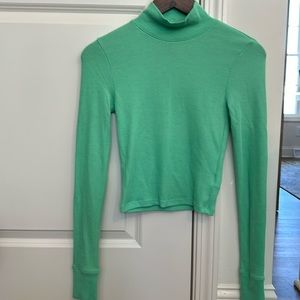 Green crop mock turtle neck top